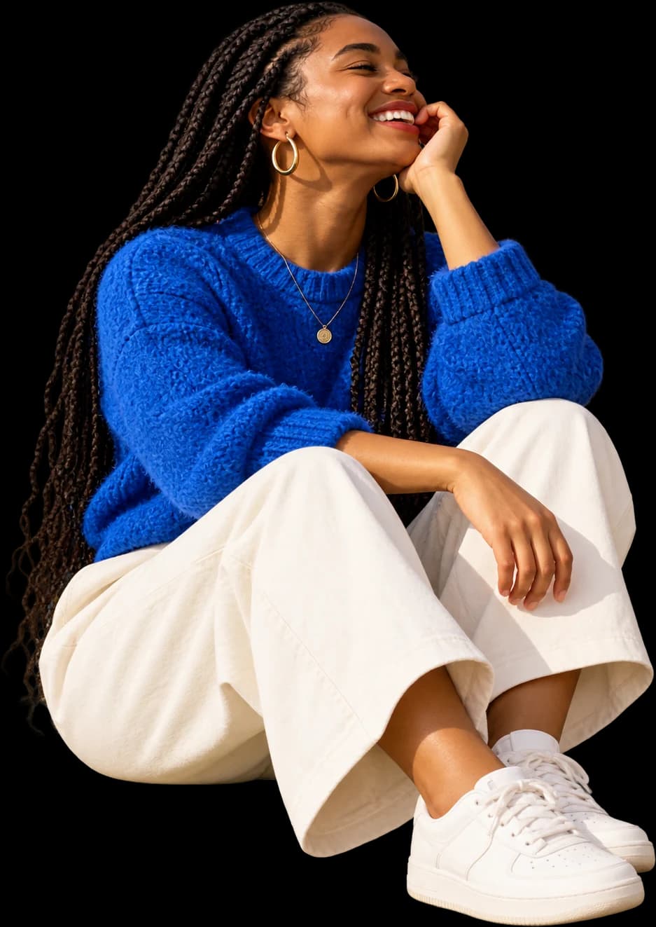 Woman with braids laughing